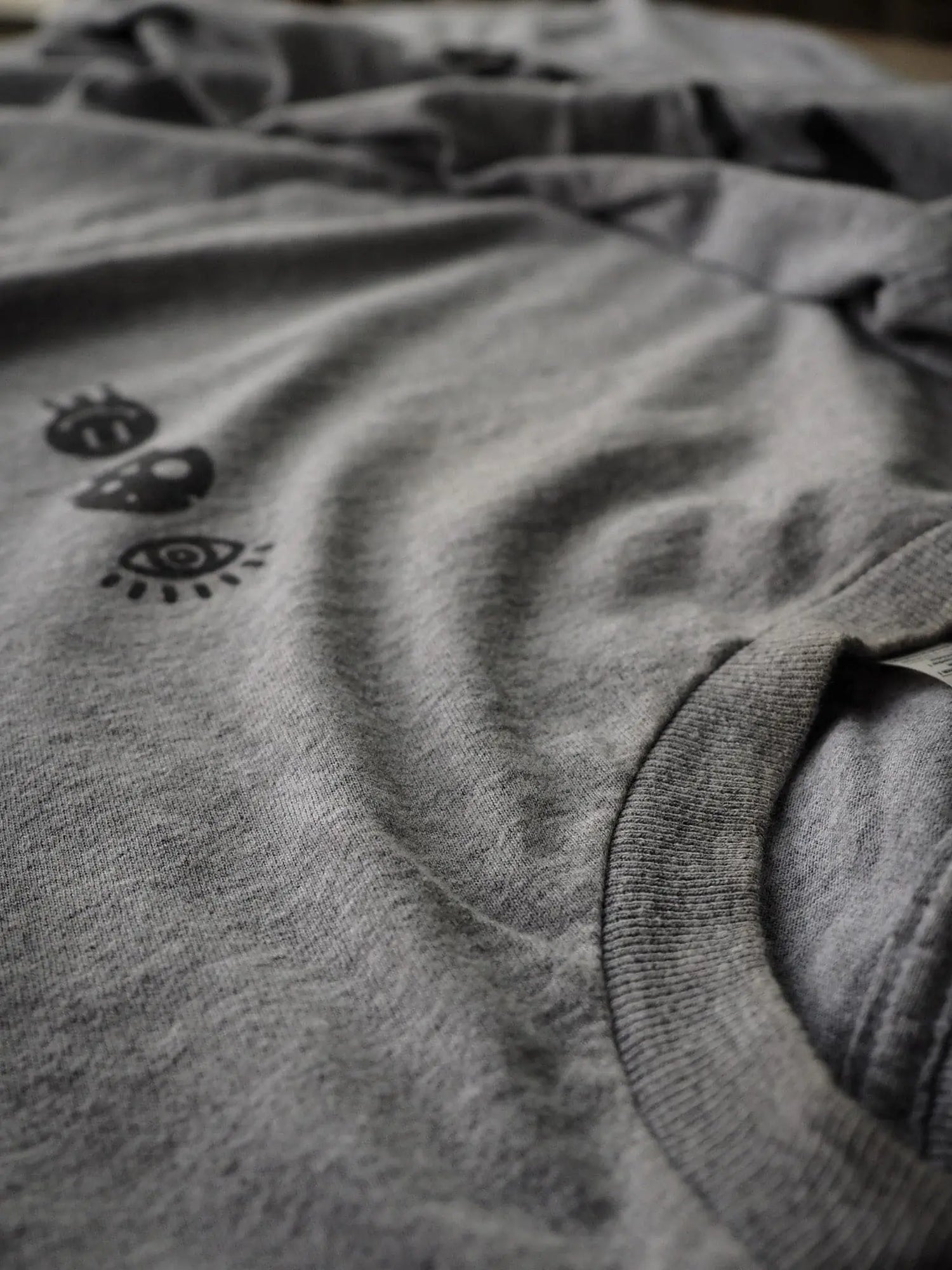 Good Wolf Happy Meal Heather Grey Long-Sleeve - Cozy long-sleeve tee made from a soft cotton/poly blend, perfect for layering or casual wear in cooler weather