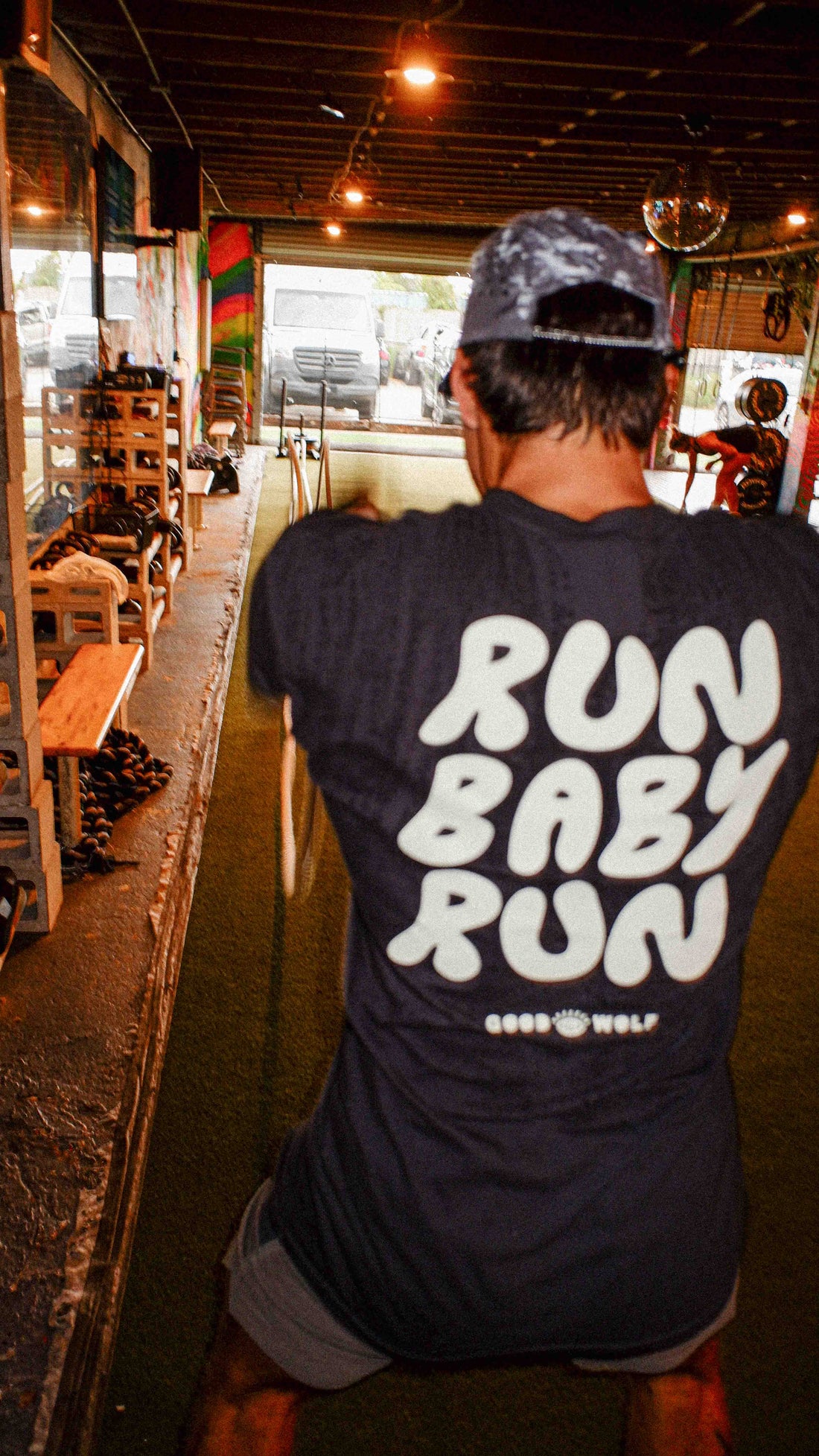 Good Wolf Run Baby Run T-Shirt – Soft and durable cotton tee featuring the &